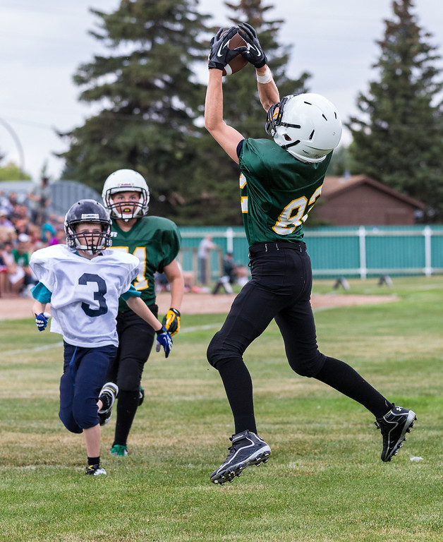 IMAGE: http://rdalrt.smugmug.com/Photos/NBCHS/2013-14/Junior-Football/NBCHS-vs-Holt-Bulldogs/i-LMKhxzs/2/XL/1DXB5491-XL.jpg